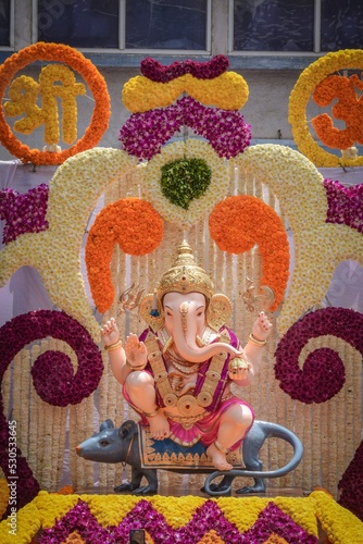 Vertical shot of The Kasba Ganapati statue photo