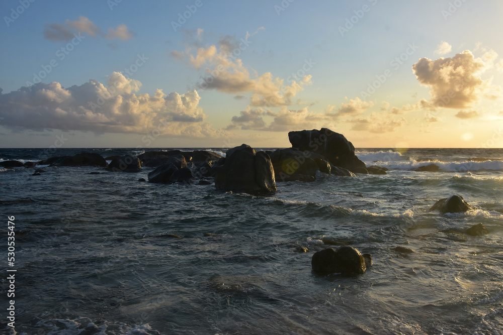 Sun Rising Over Rock Formations Along the Coast of Aruba