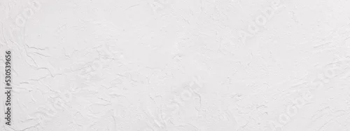 Panel kuchenny z motywem Mediterranean uneven lime plaster limestone wall surface -  handmade texture of white concrete wall  - background, panorama