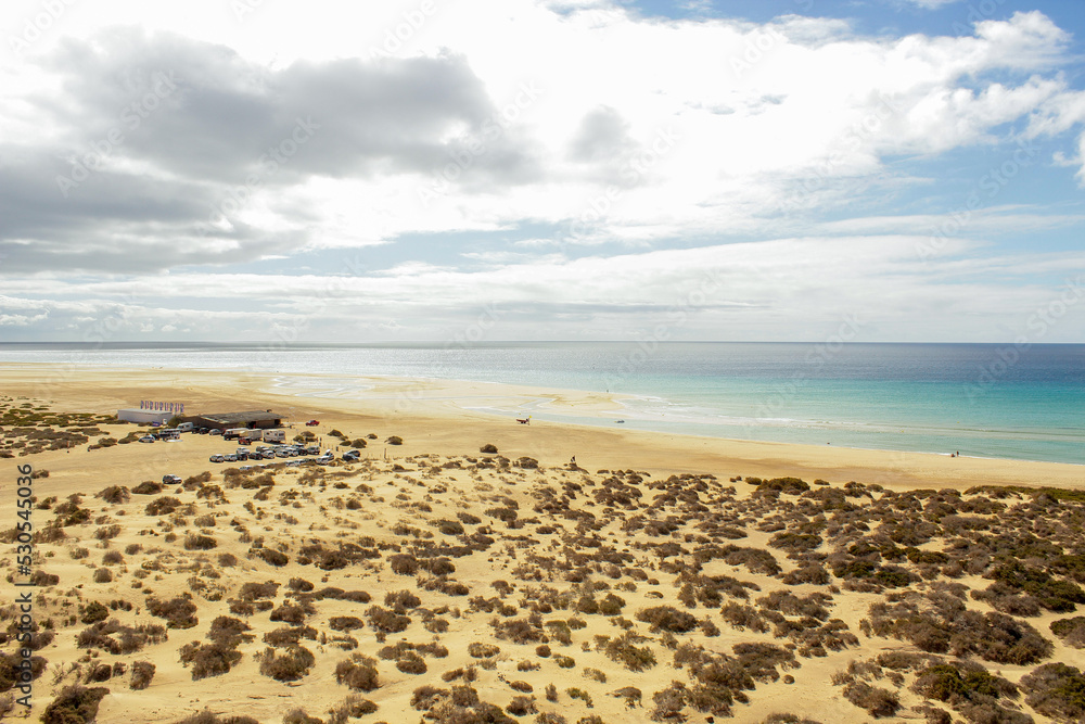 Car parking on the shores of the Atlantic Ocean, Canary islands. Fuerteventura island, Spain Car parking on the shores of the Atlantic Ocean, Canary islands. Fuerteventura island, Spain