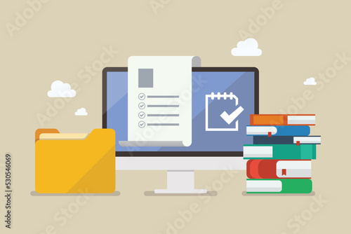 Computer monitor with folder and stack of books