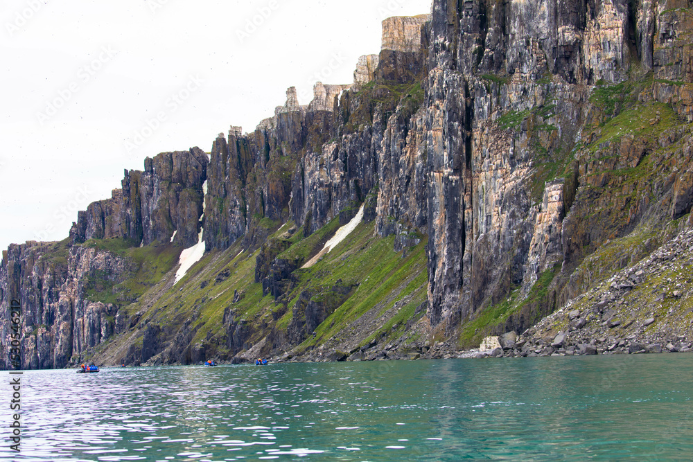 Alkefjellet cliff is the most famous cliff in Spitsbergen archipelago. It is a bird cliff overlooking Hinlopen Fjord.
Bizarre rock formation. Spitsbergen, Norway. Alkefjellet cliff is the most famous cliff in Spitsbergen archipelago. It is a bird cliff overlooking Hinlopen Fjord.
Bizarre rock formation. Spitsbergen, Norway.