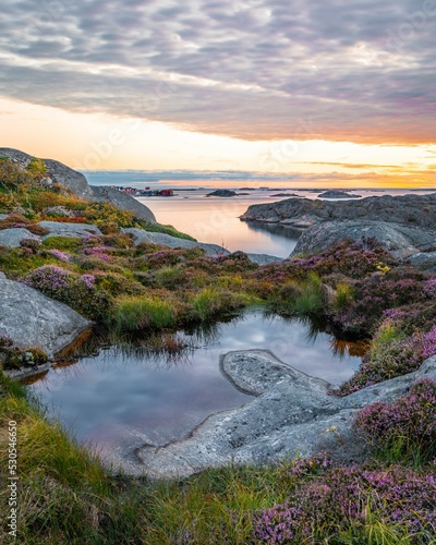 Beautiful vertical view of the lands and waters at sunset in Bleket photo