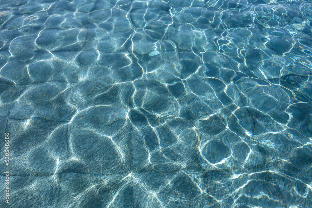 ripped water in swimming pool, summer background ripped water in swimming pool, summer background