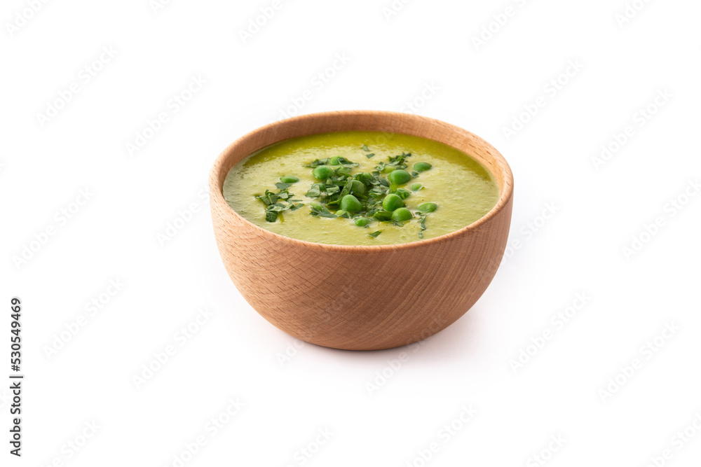Green pea soup in a bowl isolated on white background Green pea soup in a bowl isolated on white background