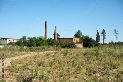 Pipe plant. Brick factory in countryside. Industrial zone outside city.