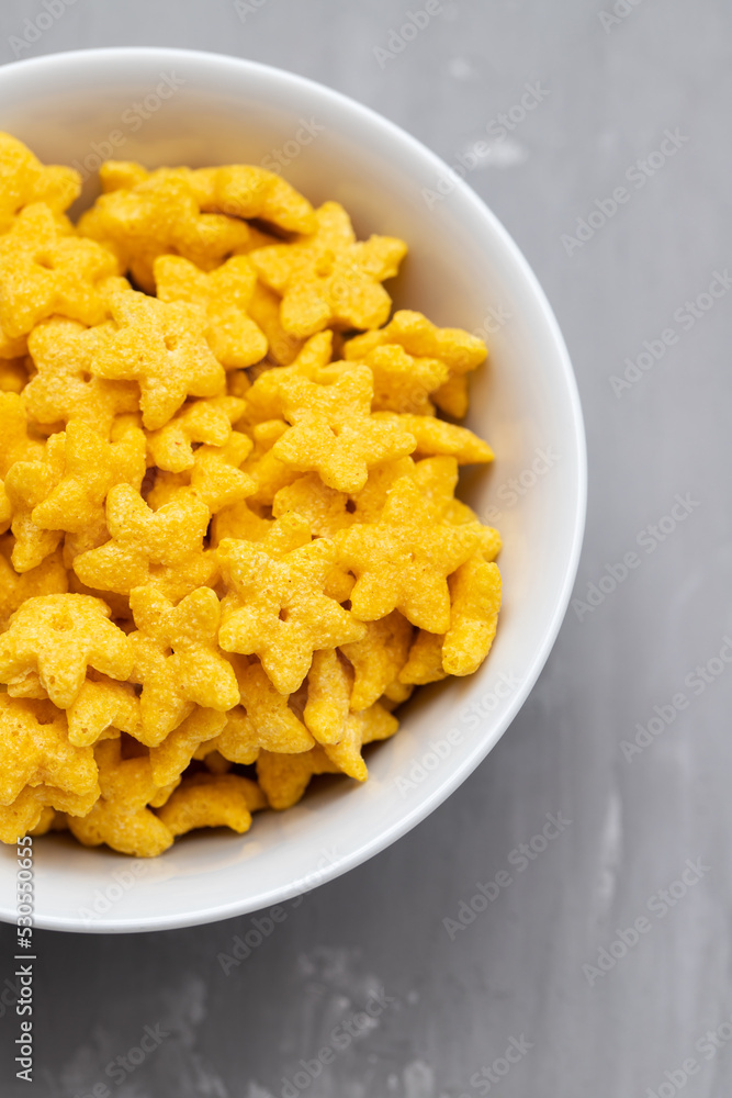 dry fresh corn stars in white bowl on ceramic dry fresh corn stars in white bowl on ceramic