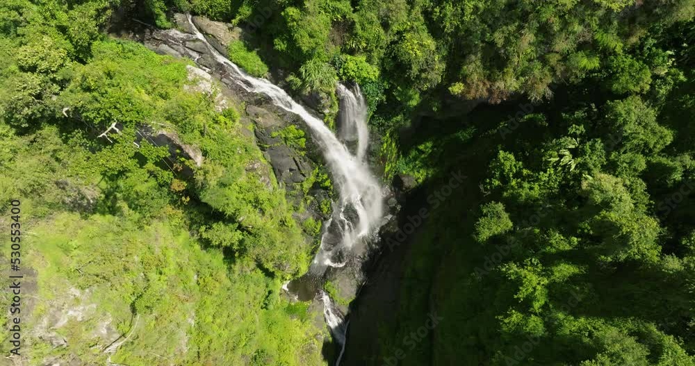 Waterfall at Cañón San Cristóbal Puerto Rico river on a Sunny day Waterfall at Cañón San Cristóbal Puerto Rico river on a Sunny day