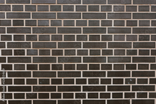 Black clinker brick wall background