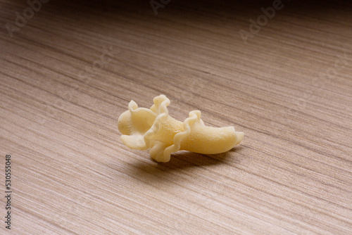 durum wheat pasta on a wooden base
