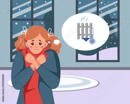 A sad young girl freezes in her house in winter. The concept of low temperature at home