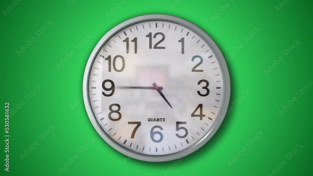 Analogue Wall Clock Timelapse Loop with Green Background Analogue Wall Clock Timelapse Loop with Green Background