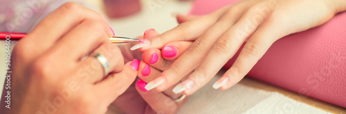 Manicure process in beauty salon  making of artificial nails