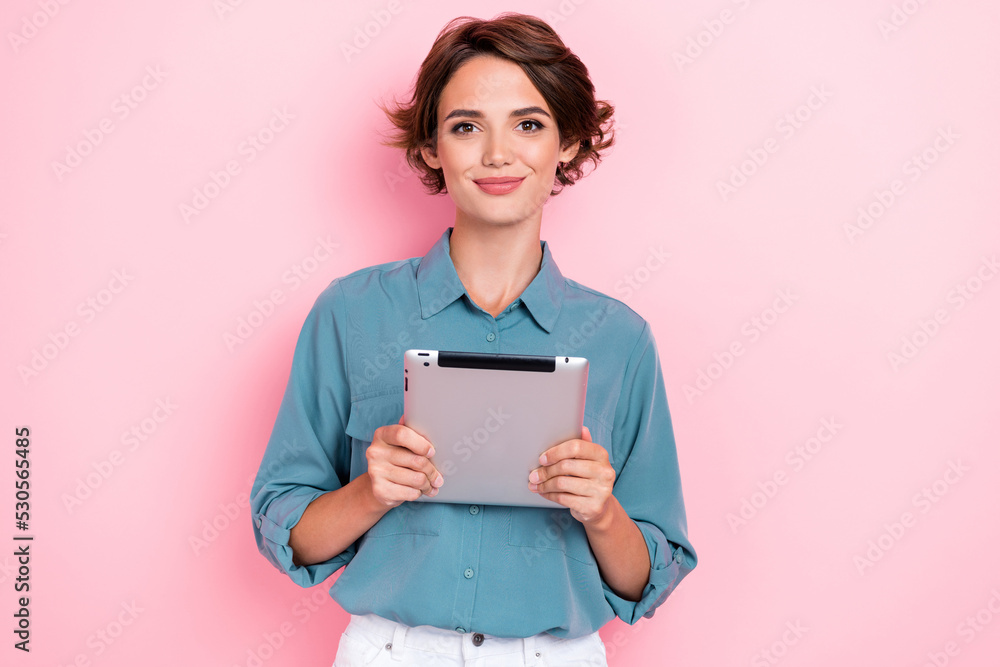 Portrait of pretty nice person hands hold use tablet typing chatting isolated on pink color background Portrait of pretty nice person hands hold use tablet typing chatting isolated on pink color background