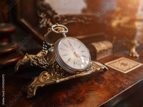 Ancient vintage antique pocket watch or clock close up.
