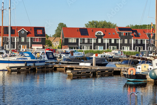 Colorful wooden houses in Reitdiephafen in Groningen, the Netherlands