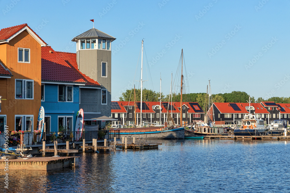 Colorful wooden houses in Reitdiephafen in Groningen, the Netherlands