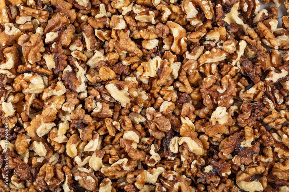 Walnuts background. Kernels walnuts. Top view. Vegetarian or healthy eating. Vegetarian or healthy eating. Walnuts background. Kernels walnuts. Top view. Vegetarian or healthy eating. Vegetarian or healthy eating.