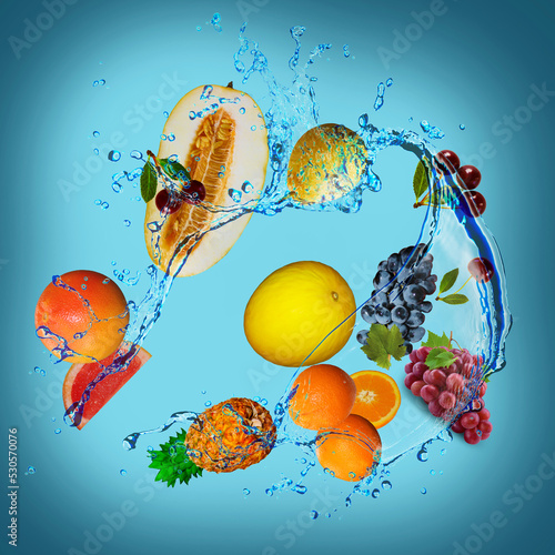 Panorama with fruits in splashes of water - juicy grapefruit, melon, cherry, pear, melon, orange, grapes, pineapple delicious dessert for the festive table