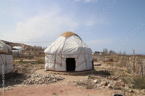 Yurt in deserty area Kyrgyzstan Bel Tam Yurt Camp in cloudy weather