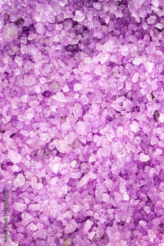 Texture of sea lavender salt in close-up. Body treatment, skin care concept. Flat lay.