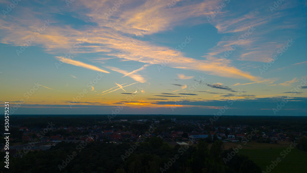 Drone view of sunset over the city