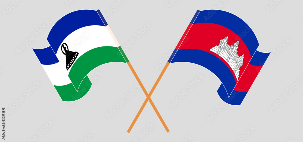 Crossed and waving flags of Lesotho and Cambodia Crossed and waving flags of Lesotho and Cambodia
