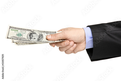 Hand of a businessman holding US dollars