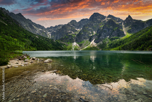 Amazing sunset in the Tatra Mountains above Eye of the Sea Lake, Poland