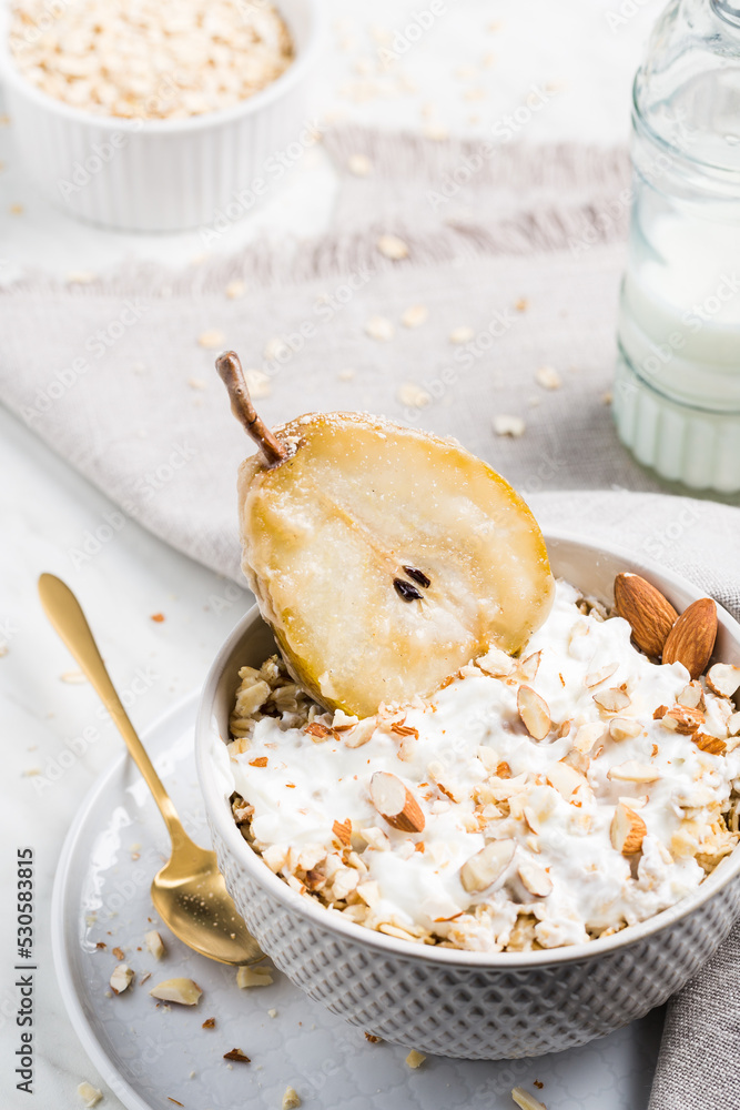 The candied pear in oatmeal with almonds and milk. It's a perfect breakfast.