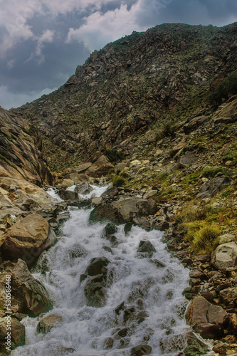 Streams and rocks in the plateau mountains of Tibet Autonomous Region.