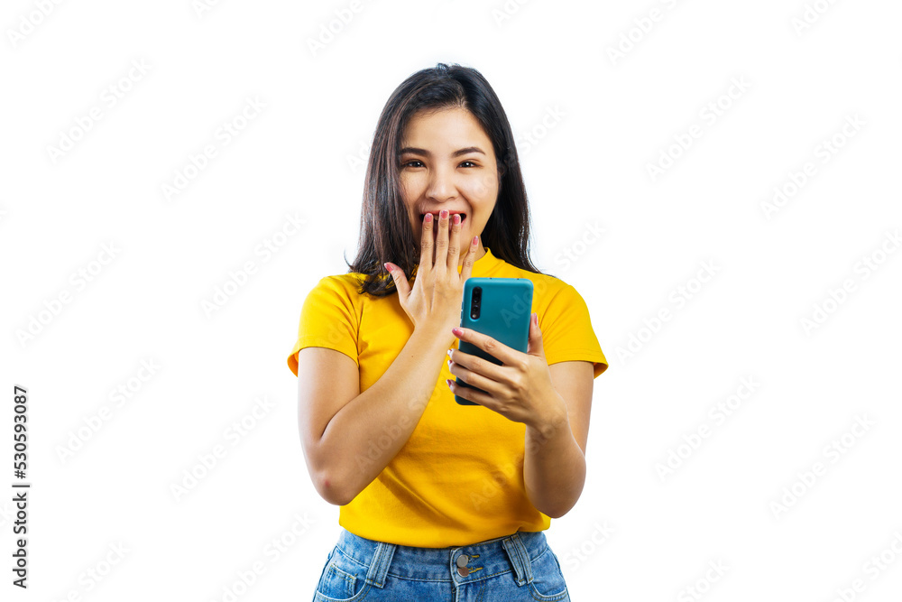 Portrait of asian woman surprised and excited at smartphone screen, receive pleasant notification or good news, email. Looking to camera. Portrait of asian woman surprised and excited at smartphone screen, receive pleasant notification or good news, email. Looking to camera.