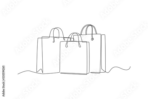 Single one line drawing shopping paper bags. Black Friday concept. Continuous line draw design graphic vector illustration.