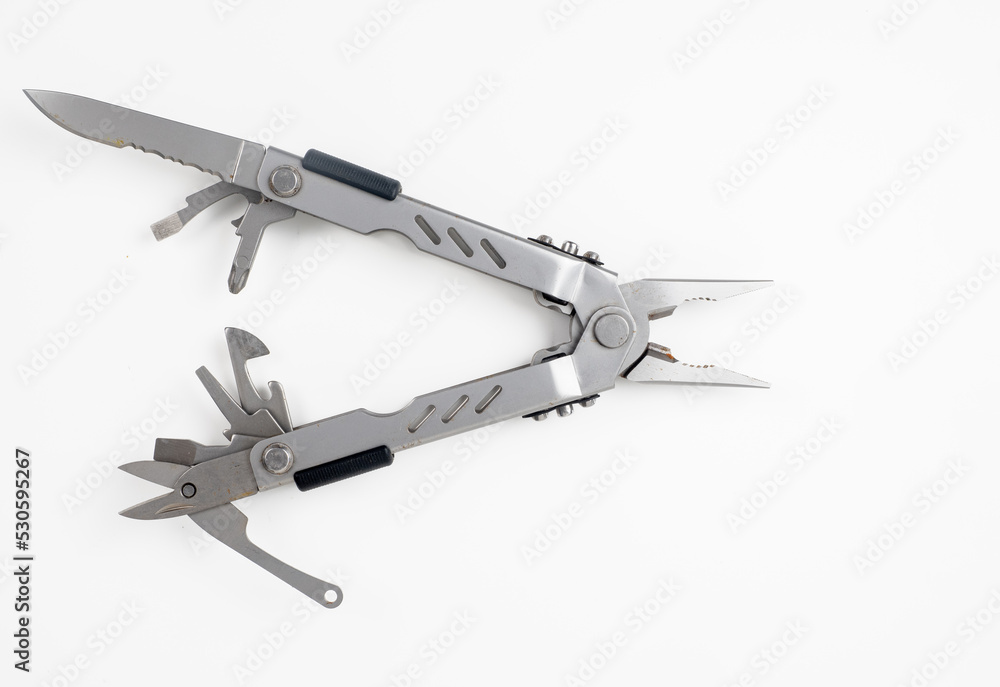 stainless steel multitool with all the accessories open stainless steel multitool with all the accessories open