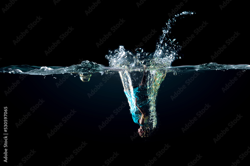 Girl in green dress under water Girl in green dress under water