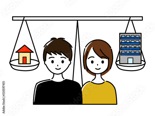 戸建てかマンションか天秤にかけて比べる若い夫婦