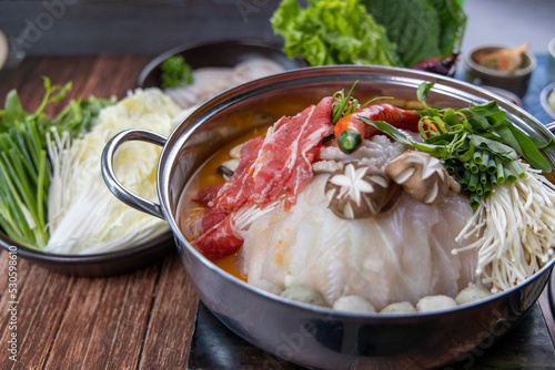Asian traditional style shabu shabu, fresh vegetables and side dishes