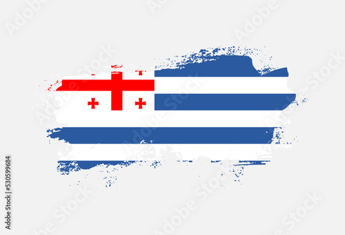 Flag of Adjara country with hand drawn brush stroke vector illustration
