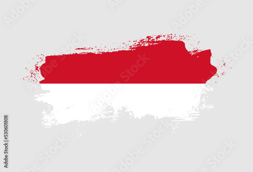 Flag of Monaco country with hand drawn brush stroke vector illustration