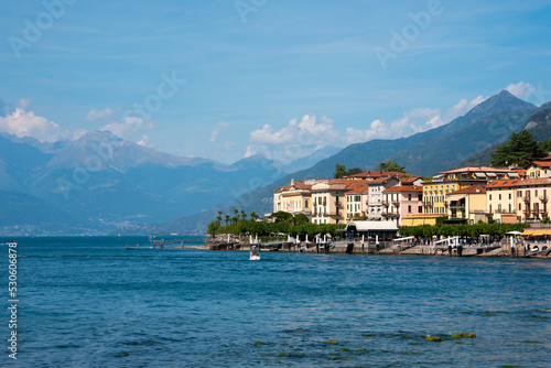 Beautiful panorama of lake Como with a small coastal town, famous tourism destination © Maresol