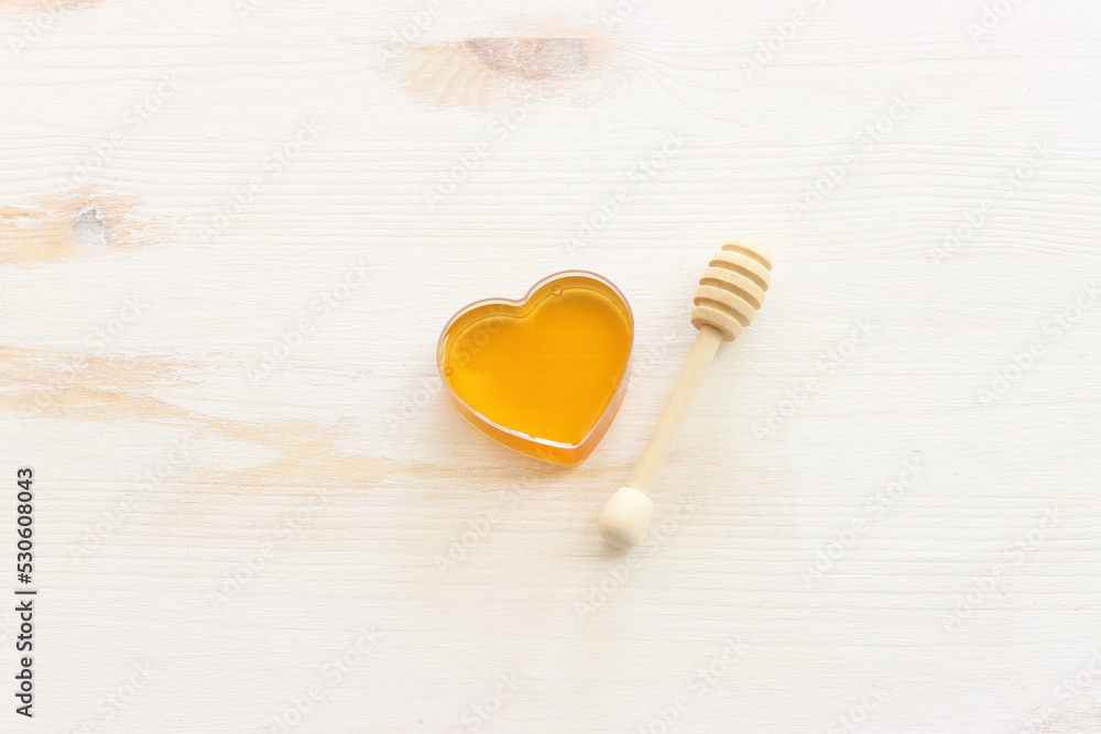 Fototapeta premium rosh hashanah (jewesh holiday) concept - honey traditional holiday symbol