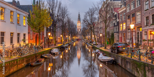 Panorama of Amsterdam canal Groenburgwal with Zuiderkerk, southern church, Holland, Netherlands.