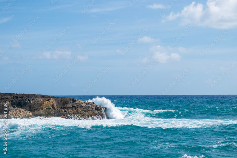 waves crashing on rocks