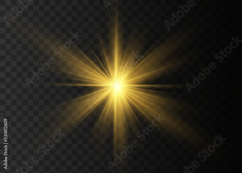The star burst with brilliance. Yellow glowing light explodes on a transparent background. Bright Star. Golden Light effect.