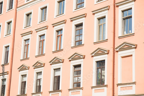 View of the facade of the house with windows.