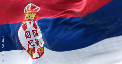 Schilderij op canvas Close-up view of the Serbia national flag waving in the wind