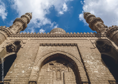 The Two great minaret of the Rifai Mosque with cloudy sky and copy space photo