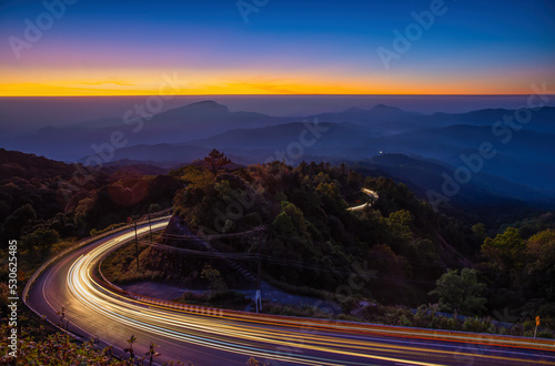 Sunrise landscape view point asphalt curved road at the kilometer 41th on Doi Inthanon National park mountains in Chom Thong district, Chiang Mai, Thailand.
