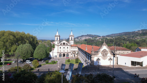 Santo Tirso, Portugal, April 16, 2022: Aerial view of the Abade Pedrosa Municipal Museum and the Monastery of St. Benedict (Sao Bento) in the city of Santo Tirso, with the Ave River in the background. photo