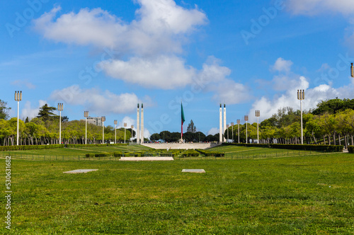 Portuguese Flag on top of the Eduardo VII Park in Lisbon, Portugal. Named after Britain's Edward VII, who visited the city in 1903 to reaffirm the Anglo-Portuguese alliance. photo